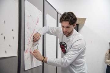 Eric Vitale works in the crime scene lab.